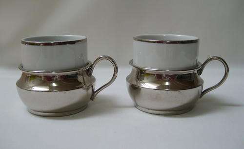 TWO VINTAGE MONOPOLI ITALIAN ESPRESSO CUPS WITH STAINLESS STEEL HOLDERS