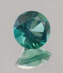 PARAIBA TOPAZ ROUND CUT 6 mm