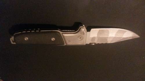 smith & Wessor extreme ops folding knife 440 steel
