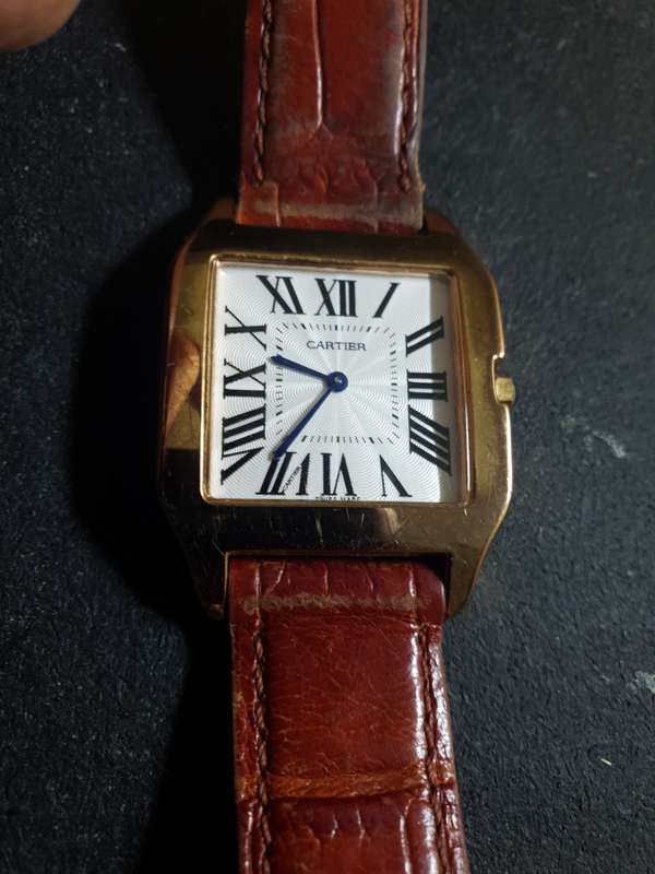 CARTIER SWISS LADIES WRIST WATCH WITH LEATHER STRAP.