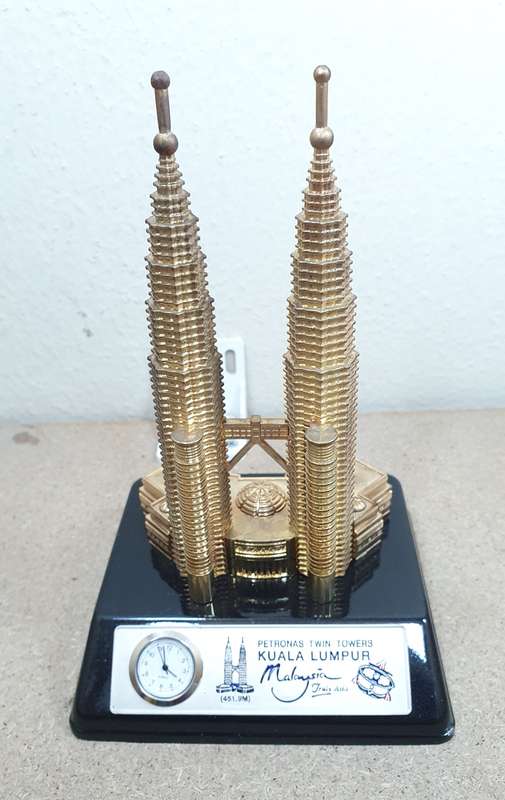 NEW CAST METAL MALAYSIAN TWIN TOWER SOUVENIR WITH CLOCK.