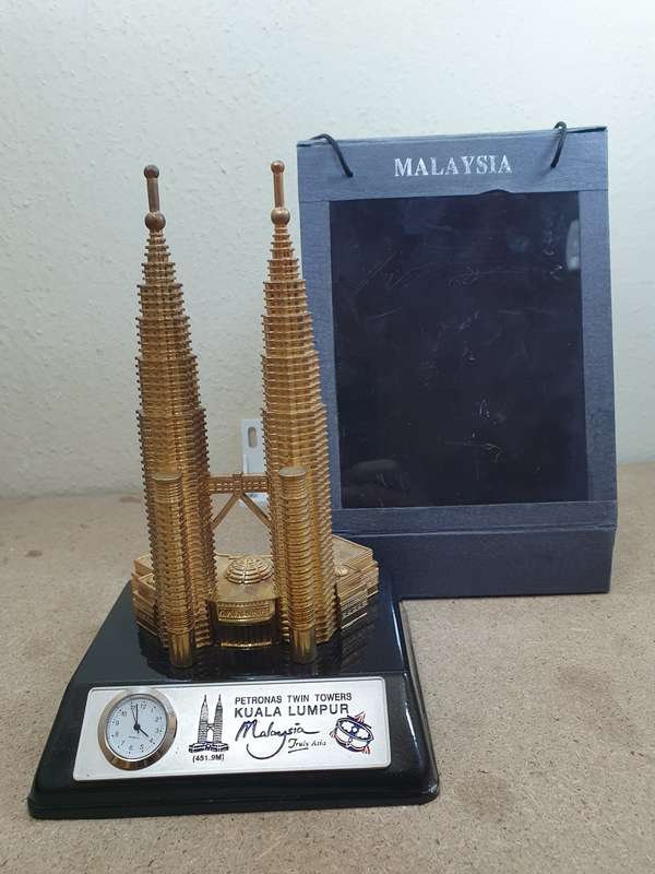 NEW CAST METAL MALAYSIAN TWIN TOWER SOUVENIR WITH CLOCK.