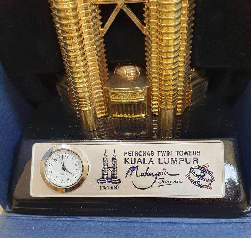 NEW CAST METAL MALAYSIAN TWIN TOWER SOUVENIR WITH CLOCK.