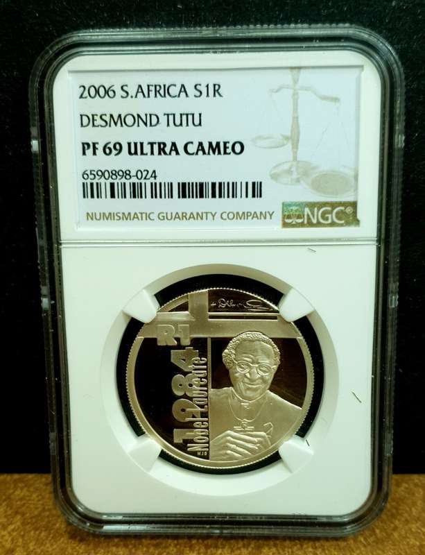 NGC GRADED PROOF SILVER 2006 DESMOND TUTU ONE RAND COIN .