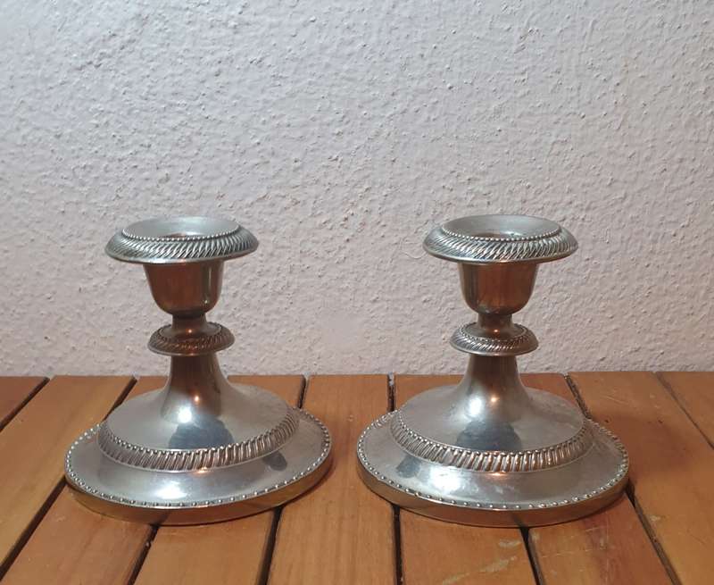 A PAIR OF VINTAGE  EPNS CANDLE STICK HOLDER