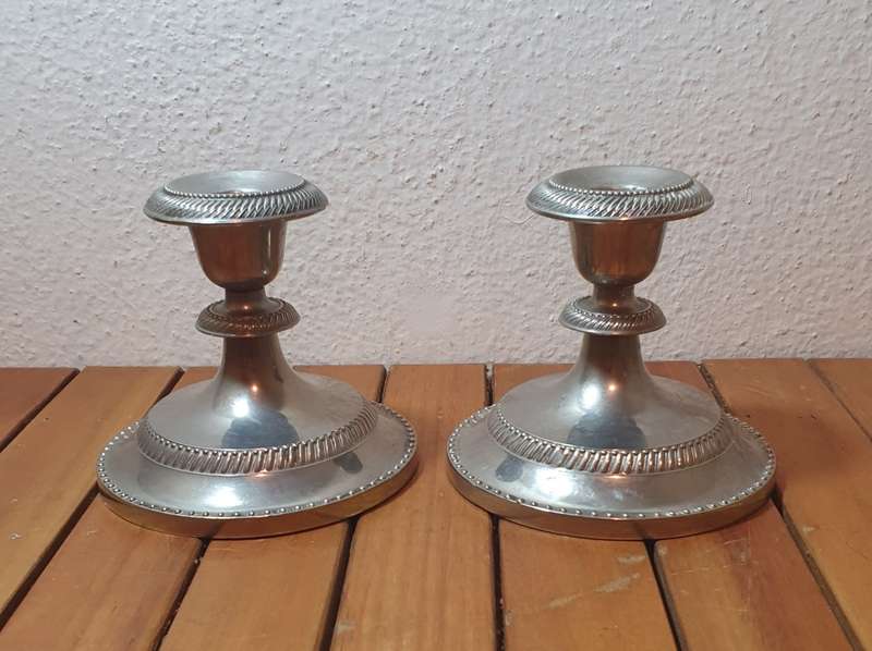 A PAIR OF VINTAGE  EPNS CANDLE STICK HOLDER