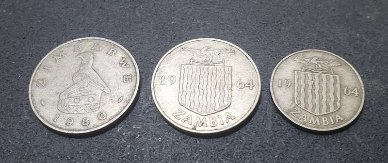 A SET OF THREE ZAMBIAN SHILLINGS & OTHERS.