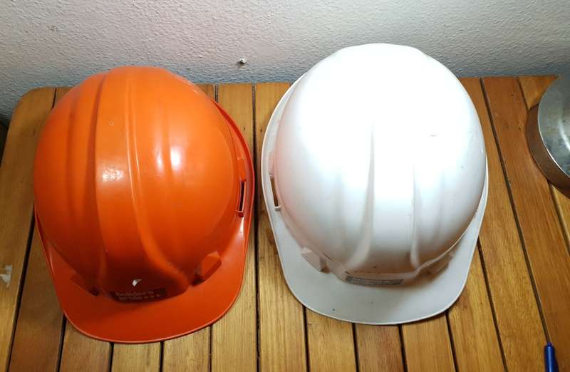 PAIR OF UNUSED BUILDERS PRIDE SAFETY HELMET.