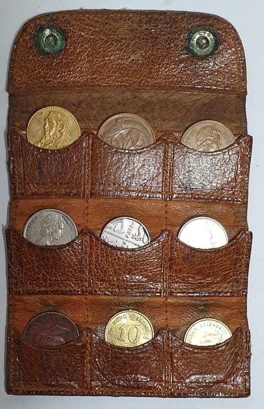 ANTIQUE LEATHER COIN POUCH WITH COINS.
