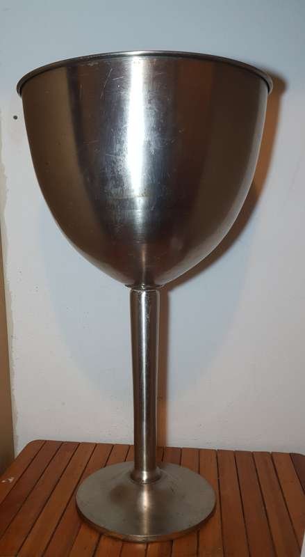 VERY LARGE ALUMINIUM WINE GOBLET SHAPED INDOOR & OUTDOOR WINE COOLER / ICE BUCKET ON STAND.