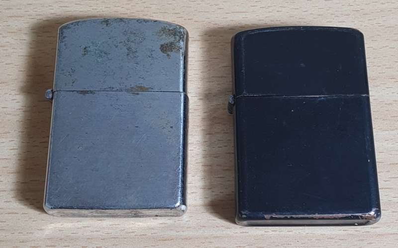 PAIR OF SECONDHAND ZIPPO STYLE LIGHTERS IN WORKING CONDITION.