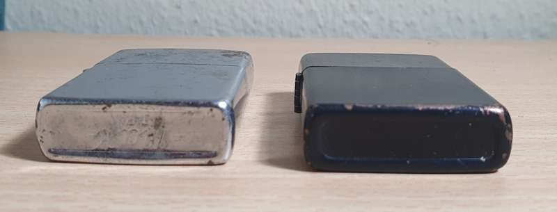 PAIR OF SECONDHAND ZIPPO STYLE LIGHTERS IN WORKING CONDITION.