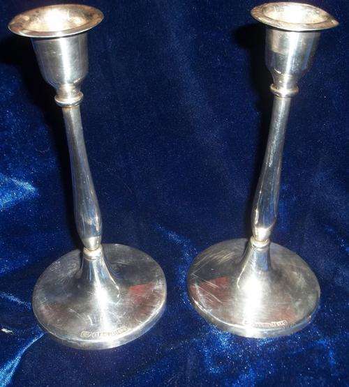 2 X REGAL SILVER PLATED CANDLE HOLDERS.