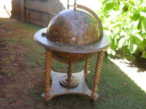 SWIVEL GLOBE BAR CABINET