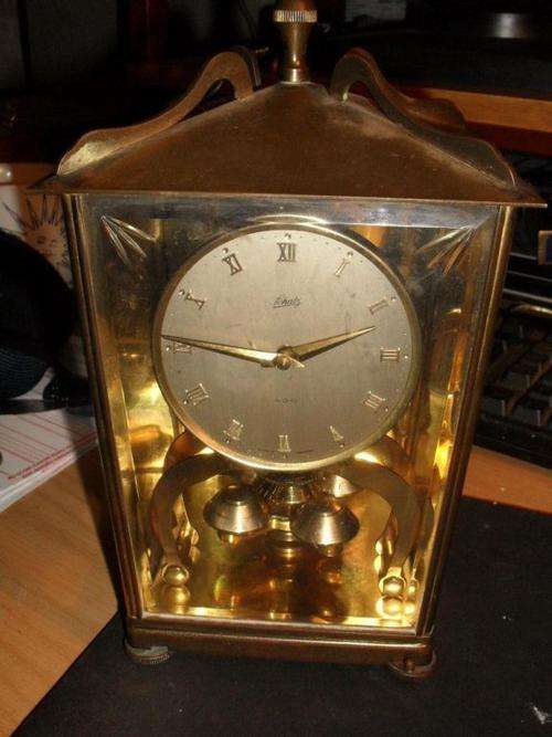 LOVELY ANTIQUE BRASS CLOCK FROM 1956