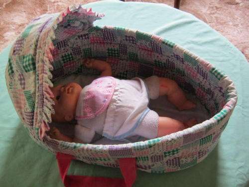 Carrycot (length +/- 40cm) with Doll