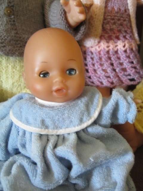 Lot of 8 vintage and/or collectible dolls.