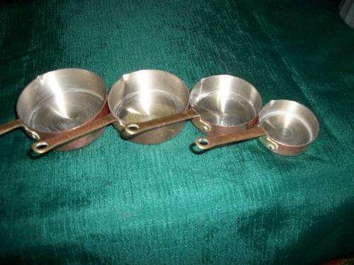 COPPER MEASURING PANS X 4
