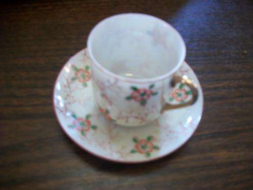 SMALL CUP AND SAUCER