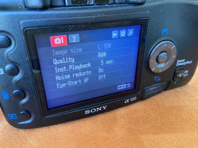Sony Alpha A100 Digital SLR Camera, 18-70mm + 300mm Telephoto Lenses + Bags
