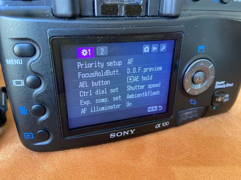 Sony Alpha A100 Digital SLR Camera, 18-70mm + 300mm Telephoto Lenses + Bags