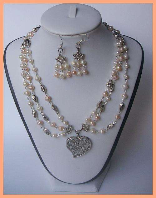 Genuine three strand peach and white freshwater pearl necklace, free earrings!