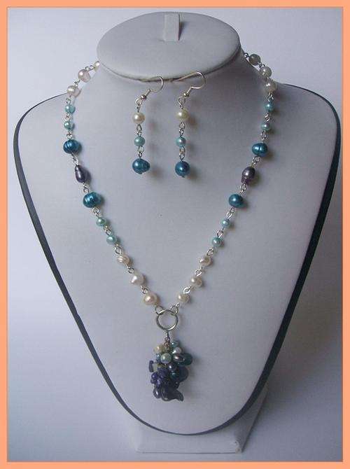 Genuine white and blue freshwater pearl necklace, with cluster pendant