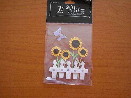 Flowers, sunflowers on fence