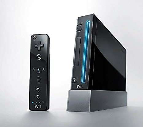 Wii Console + Controller + 3 Games