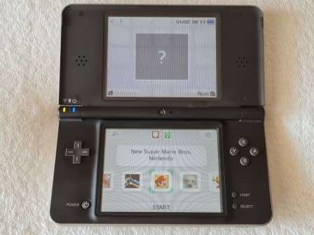 Nintendo DSi XL Console + 20 Games