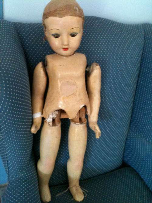 Vintage doll, composition and bisque eyes very old walker doll with crier