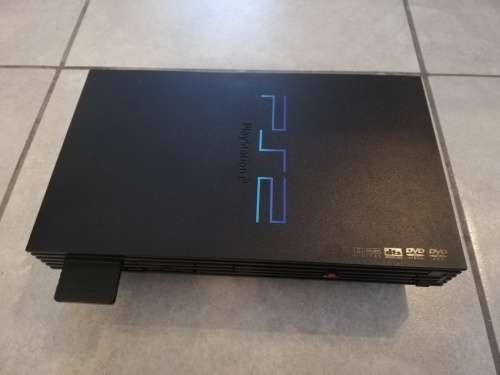 PS2 console + Accessories + Games