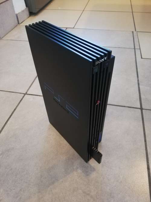 PS2 console + Accessories + Games