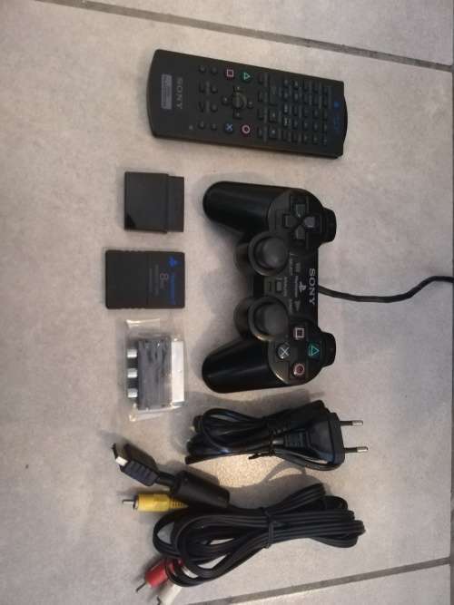 PS2 console + Accessories + Games
