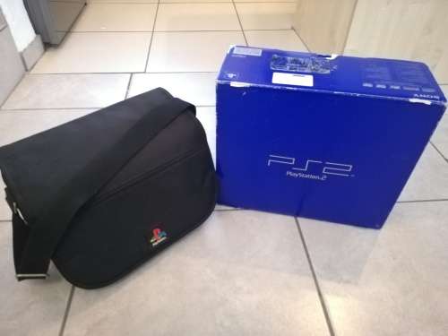 PS2 console + Accessories + Games