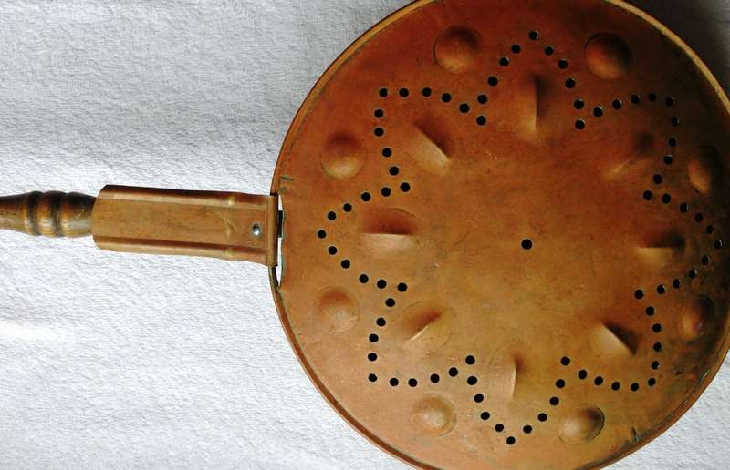 Vintage copper and brass bed warming pan