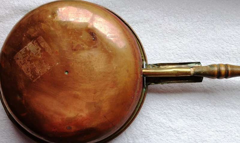 Vintage copper and brass bed warming pan