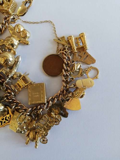 ** CHARM BRACELET ** SOLID 9CT GOLD ** 1950s ERA ** VERY HEAVY 83.71 GRAMS **