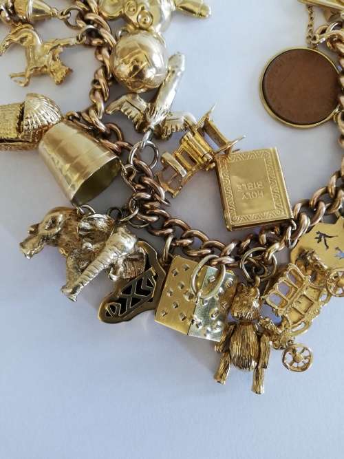 ** CHARM BRACELET ** SOLID 9CT GOLD ** 1950s ERA ** VERY HEAVY 83.71 GRAMS **
