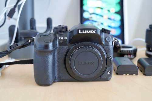 Panasonic Lumix GH4 Mirrorless Camera with 25mm/0.95 prime lense and a 36~72mm/3.5 zoom lense