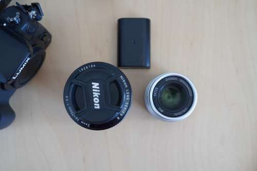 Panasonic Lumix GH4 Mirrorless Camera with 25mm/0.95 prime lense and a 36~72mm/3.5 zoom lense