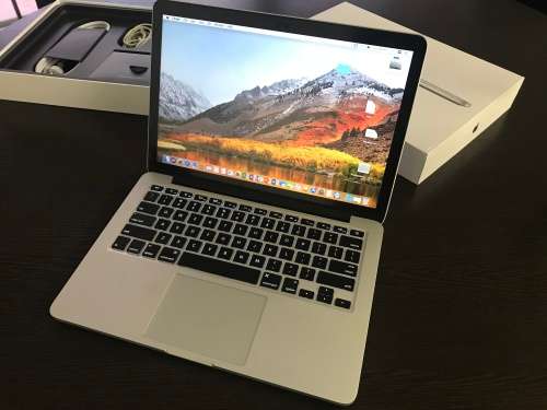 MacBook Pro 13 inch,  8gigs Ram, 2.4Ghz up to 3.7Ghz speeds, 256 SSD HDdrive, Retina display