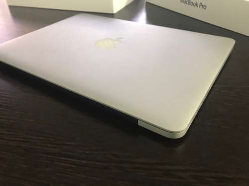 MacBook Pro 13 inch,  8gigs Ram, 2.4Ghz up to 3.7Ghz speeds, 256 SSD HDdrive, Retina display