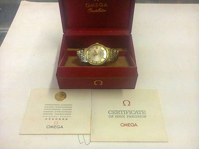 Omega Constellation gold watch