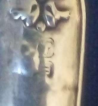 TEA STRAINER WITH HALLMARKED SILVER HANDLE