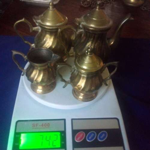 ORNAMENTAL BRASS TEA AND COFFEE SET