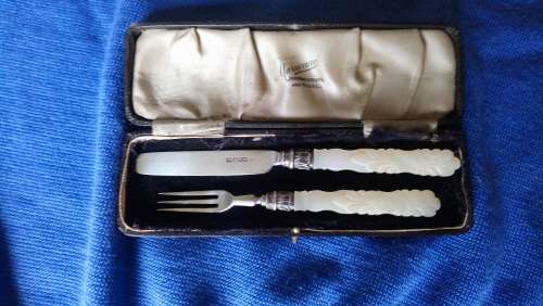 Hallmarked silver child's knife and fork set.