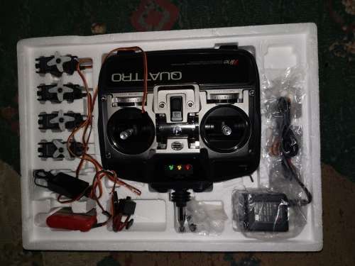 Radio controlled airplane with radio transmitter