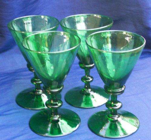 FOUR GREEN GLASSES