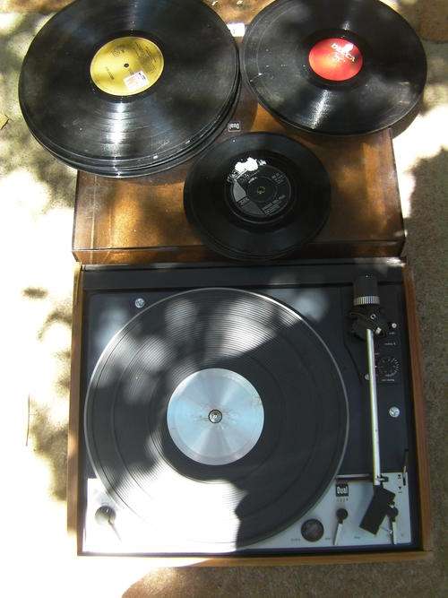 RECORD PLAYER WITH 25 RECORDS